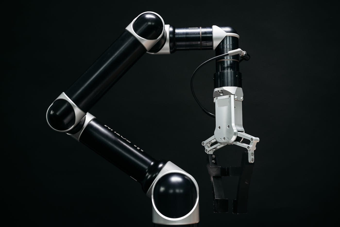 Robotic arm representing operational automation